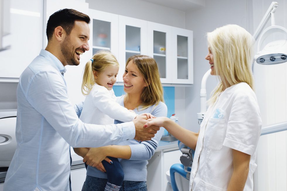 blog-family-talking-to-dentist-dr-zaborski-staff-at-zaborski-dental-980x653