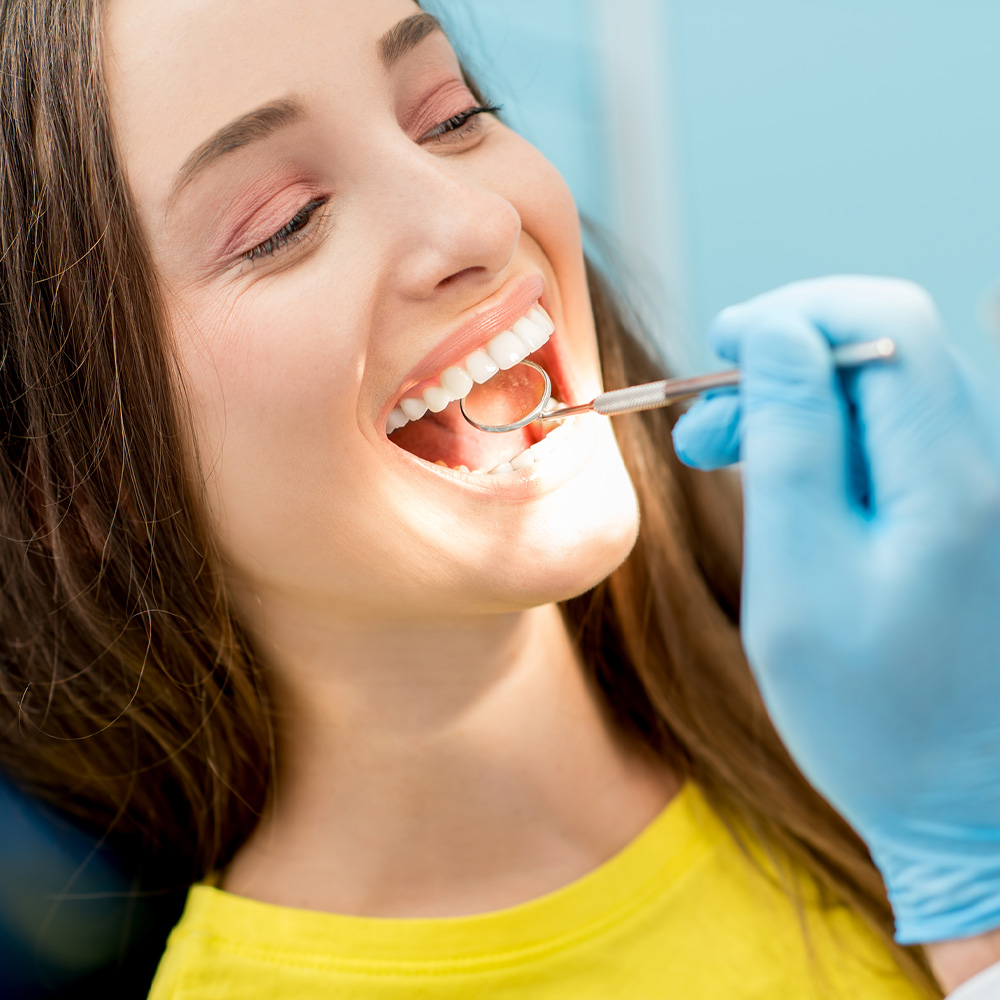 women getting teeth cleaning at dr zaborski dental